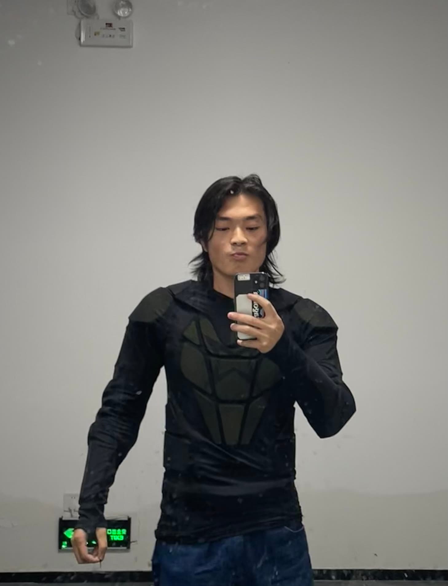Du Chongyang wearing motorcycle body armour